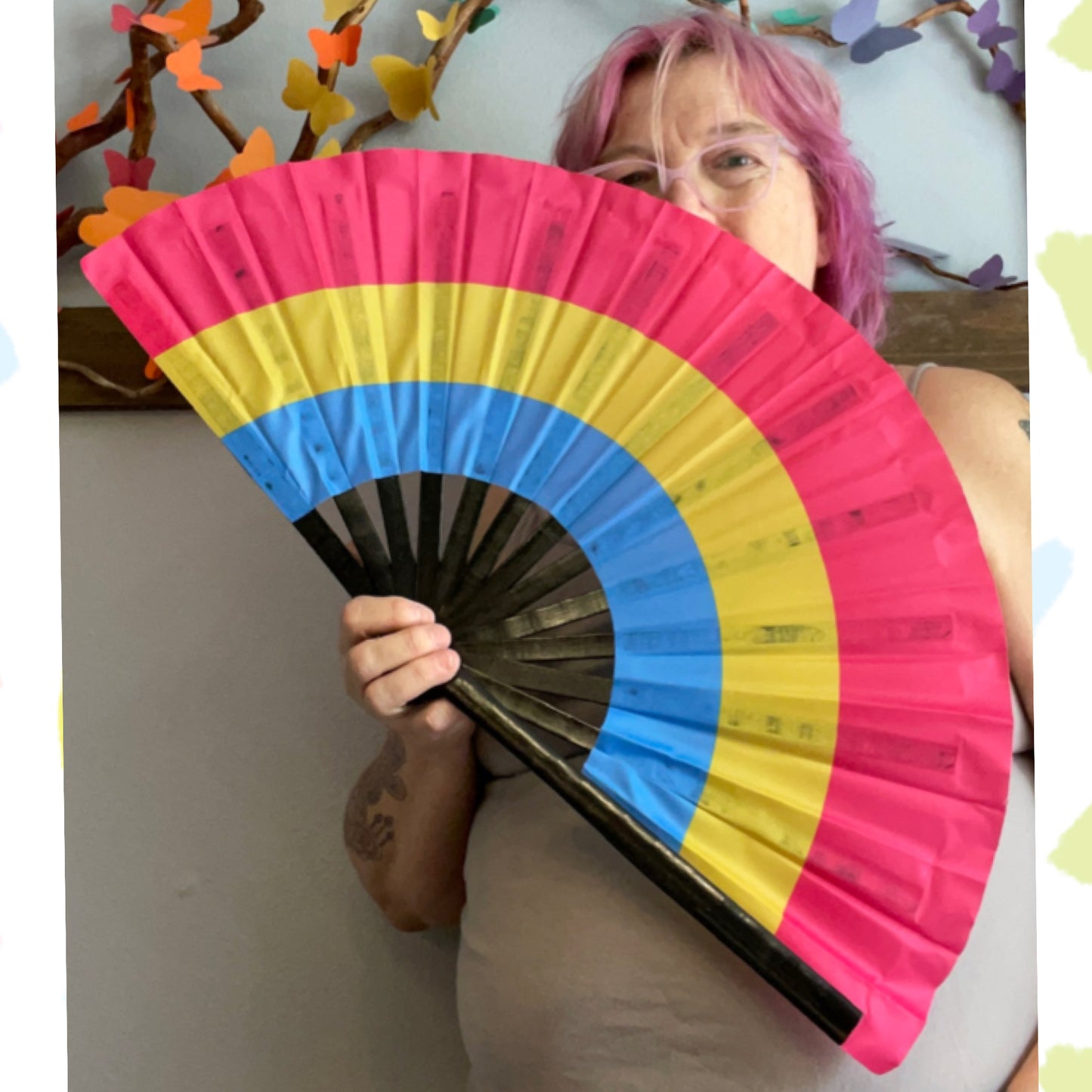 Pansexual folding hand fan