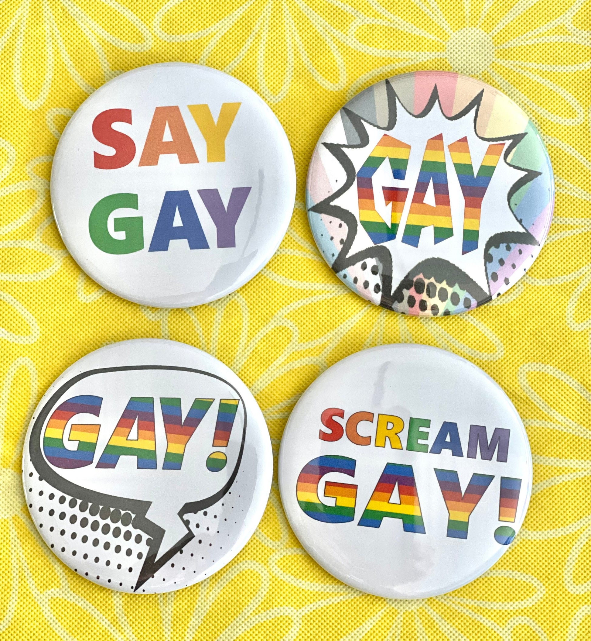 Say Gay! LGBTQIA assortment of buttons pins badges